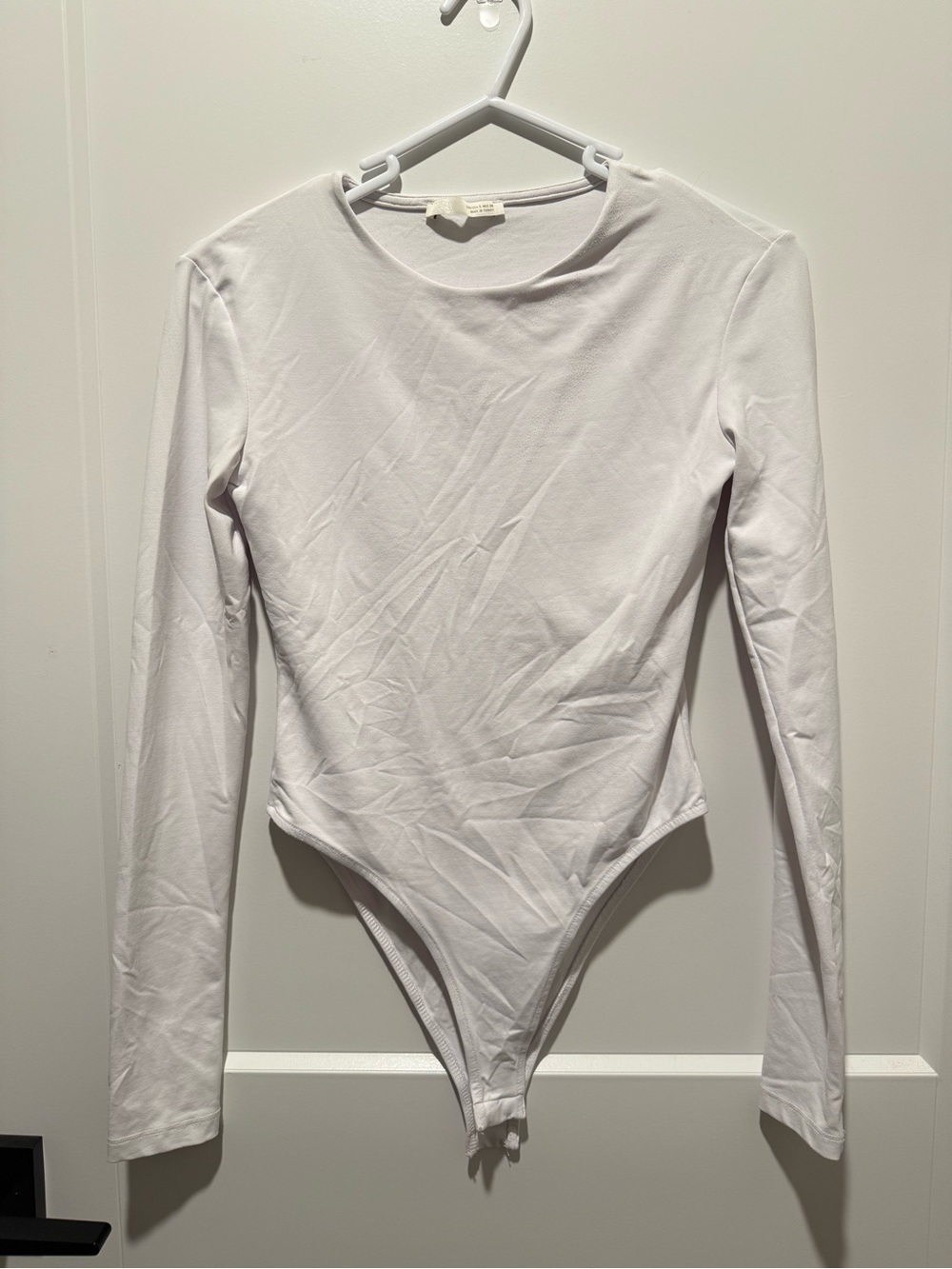 White Long-Sleeve One-Piece Bodysuit